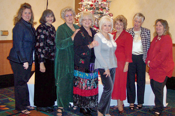 (from left) are Karen Bynum, Vicky Guagliardo, Sally Benson, Jeanne Long, Tamara Hughes, Danette Erickson, Annick DeVreker and Dee Coleman. 
