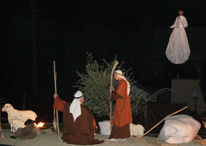 An angel appears to the shepherds in the field telling of the Savior’s birth, one of the scenes of the Drive-Thru Nativity at Community Christian Church of the Foothills. Photo by Robin GOLDSWORTHY
