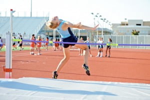 Emmy Walker taking second in the high jump (4-10).