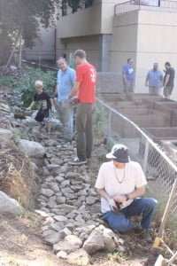 Among the projects undertaken was the installation of a rock walkway behind the Fire House.