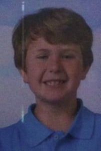 Ethan is 8-years-old, sandy blonde hair, 4'11" tall and weighing 65 pounds.