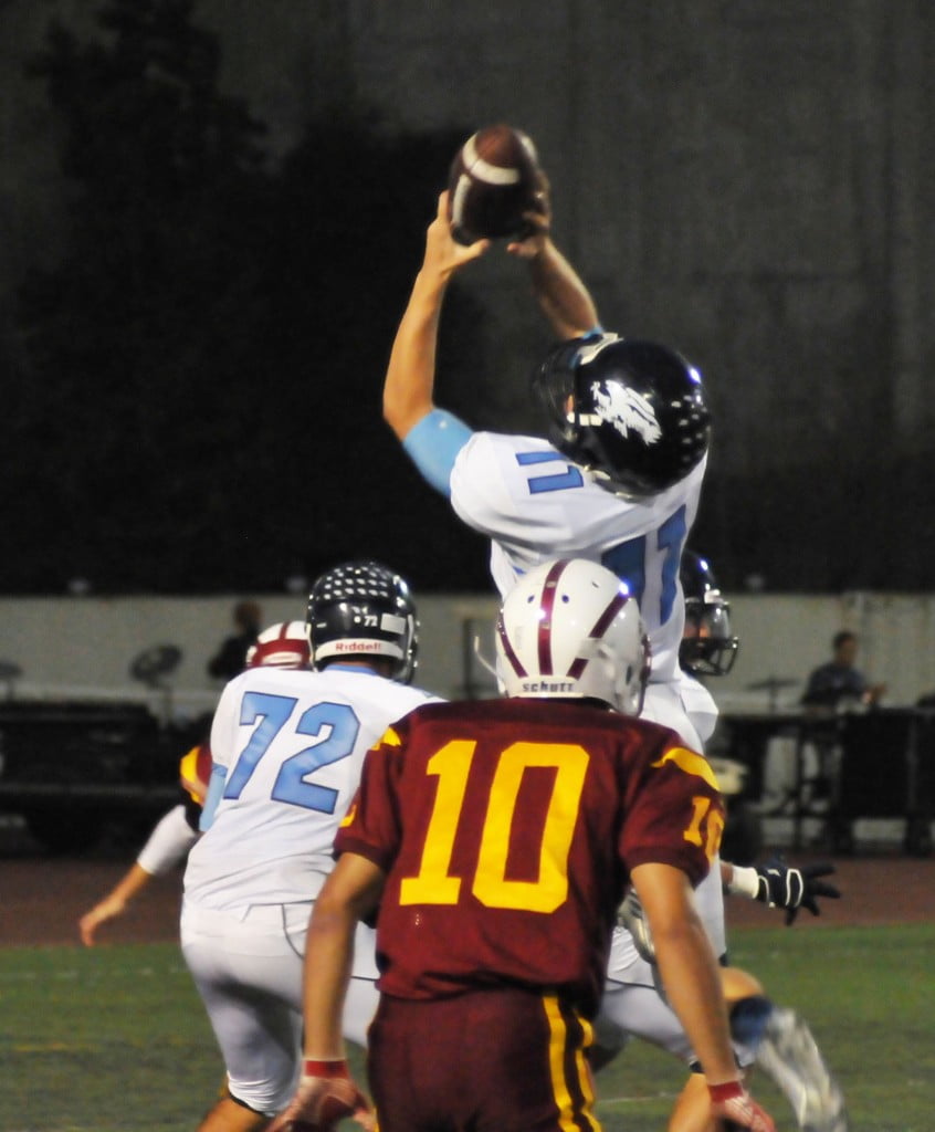 Photos by Jason BALLARD Kevin Hello intercepts the ball in the first quarter, running it in for a touchdown.