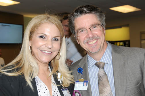 Nasly Zelaya, manager, Physician Relations Business Development with Kevin Roberts, GAMC president/CEO.