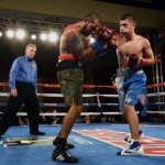 DSC_6521 Luis Seldano of Duarts (right) delivers a blow to Luis Diaz