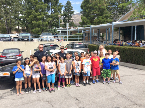 NO 5 near the police car