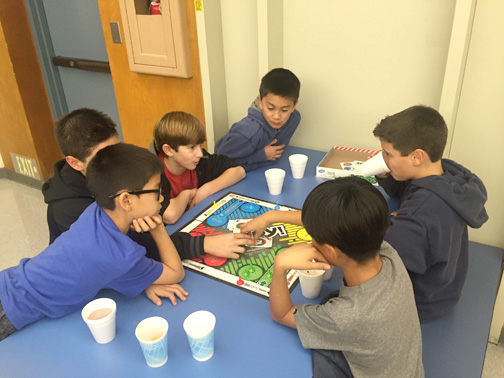 8.Boys enjoying Game Night