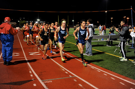 Philip Thomas and Colin FitzGerald seen running the 3200m.