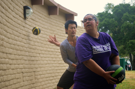 Exercise gear, like medicine balls, are provided by trainers.