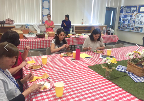 Teachers and staff enjoying a delicious luncheon provided by VV PTA