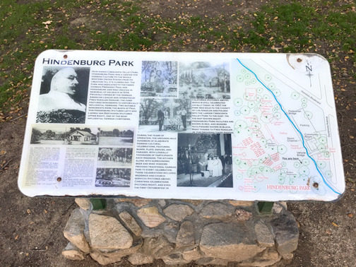 Photo by Charly SHELTON The Hindenburg Park interpretive panel that is in place currently. The edges have leaked water in, degrading the material and warping the sign itself. The new interpretive panel will replace this panel.