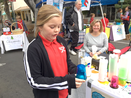 Abby Woods, a fifth grader from Palm Crest Elementary, came up with the illuminating idea of making lights out of all types of containers including colorful cups. 