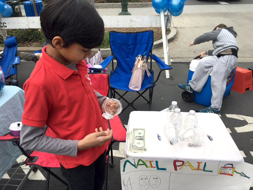  Nayan Shah raised money for his Nail Pail during the Montrose Harvest Market. 