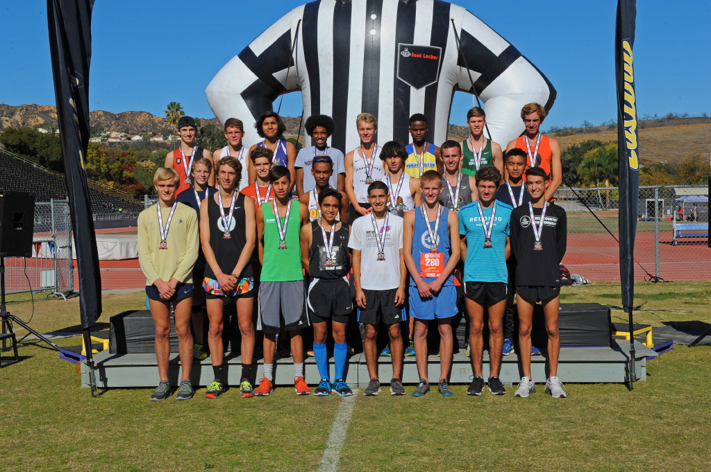 The top 23 runners were honored at the podium. FitzGerald is second row, second from left.