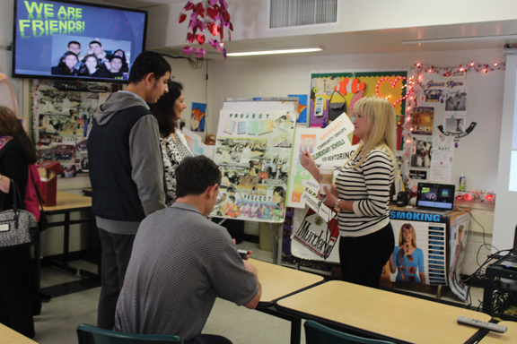 File photo Virginia Benzer, a teacher at Clark Magnet High School (shown here at the 2015 open house), visits with some prospective students during the school’s annual event. 
