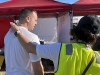 Jessica-Bolstad-puts-ice-on-the-neck-of-runner-Brandon-Budwig