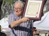Ken Grayson holds up a certificate from Adam Schiff's office presented at the Montrose Centennial Days Celebration.  (Photo by Ed Hamilton / Feb 24 2013)