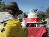 Brett Tyler takes a picture of the cake before the cake cutting ceremony at the Montrose Centennial Days Celebration.  (Photo by Ed Hamilton / Feb 24 2013)