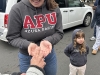 WRAP-Tricia-Goldsworthy-gets-a-squirt-of-disinfectant-while-daughter-Aubrey-looks-on