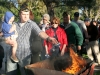 Steven Thibault, a Marine Corp Vet, with his son, Jackson, throw a piece of a retired  american flag into the fire at the Vetrans Memorial Service, Two Strike Park, La Crescenta, Ca. (Photo by Ed Hamilton / nov 11th, 2012)