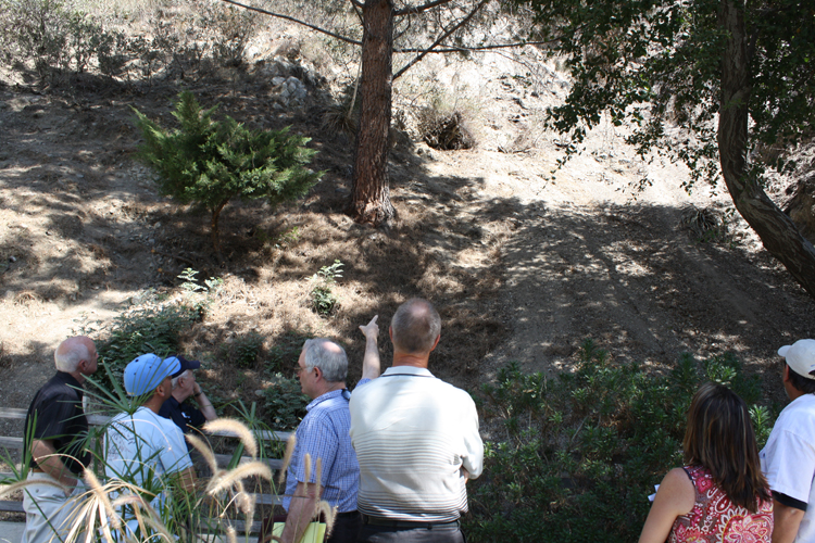 Starfall Drive »Residents consider the potential danger of falling rocks from the burned out hillside directly from behind their homes. The land is owned by L.A. County Public Works.