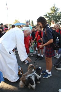  All animals took part in Blessing of the Animals at Holy Redeemer Catholic School on  Oct. 2.  Pictured from left, “Father Jack” Foley,  Ace the bunny and Gabriel Buzzelli.  Photos by Mary O'KEEFE