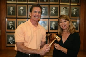 Outgoing chairman Sam Longo Jr. receives an engraved gavel from Kay Linden. Photo by YMCA of the Foothills 