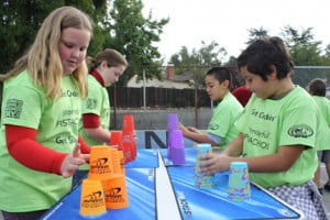 Monte Vista Elementary students join others around the world in breaking the Guiness World Record in Sport Stacking.  From left, Taylor Pasohal, Ashley Dean, Brandon Barseghian and George Barseghian.