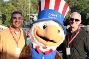La Cañada residents Aaron Prince and John Loomis cheer on the U.S. Men’s Olympic Water Polo Team with Sam Eagle, mascot of the 1984 Olympic Games in Los Angeles. La Cañada residents Aaron Prince and John Loomis cheer on the U.S. Men’s Olympic Water Polo Team with Sam Eagle, mascot of the 1984 Olympic Games in Los Angeles.