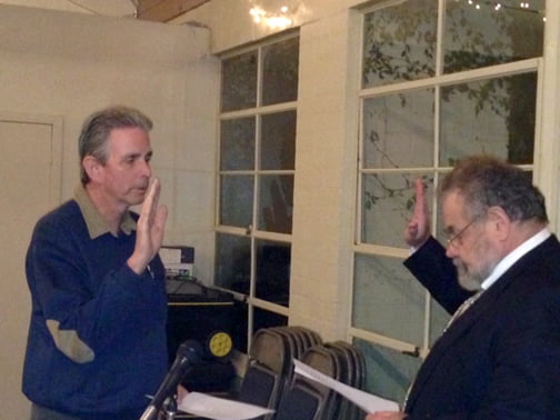 Bob Thompson is administered the oath.