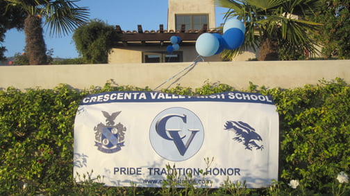 Photos by Misty DUPLESSIS A banner welcomed graduates of the first class of Crescenta Valley High School to dinner on Saturday night at the Angeles National Golf Club.
