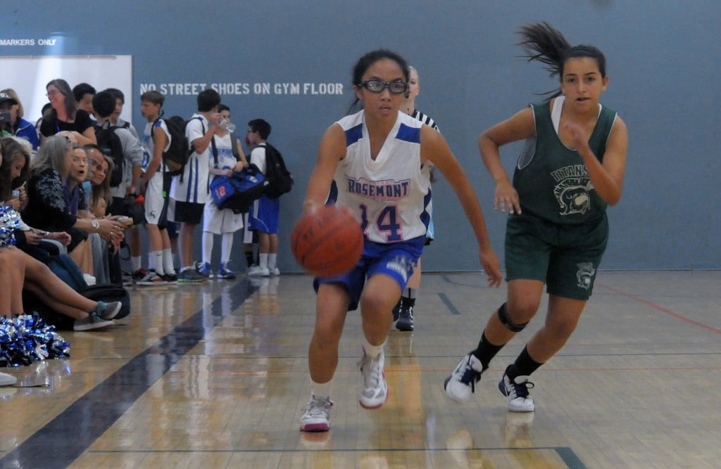 Rachel Dayag keeps it away from the Titans.