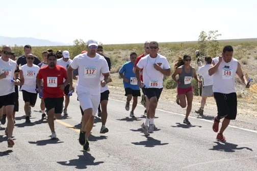 Photo by James GOLDSWORTHY Law enforcement participants in this year’s Baker to Vegas relay start the first leg of the 120-mile trek.