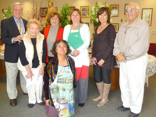 Photo by Penny BAISELY Members of St. Joseph Table Committee, led by Maria De Segquero (in front). Others standing from left are branch President Al Restivo, Mary Mancuso, Paula Clinnon, Phyllis Harb, Rae Anne Mertz and branch Treasurer Joseph Vinci.