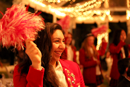 Freshman Katherine Rojas cheers on the paddle pledge at FSHA’s annual Gala.