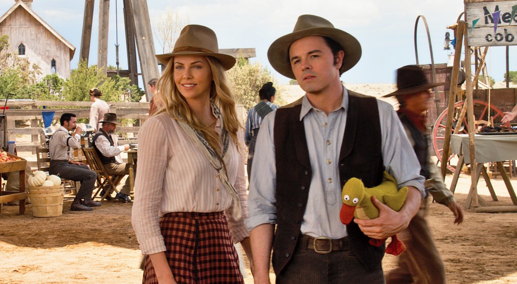 Photo Courtesy Universal Pictures Charlize Theron, left and Seth MacFarlane play a pair of old west sweethearts in ‘A Million Ways to Die in the West.’