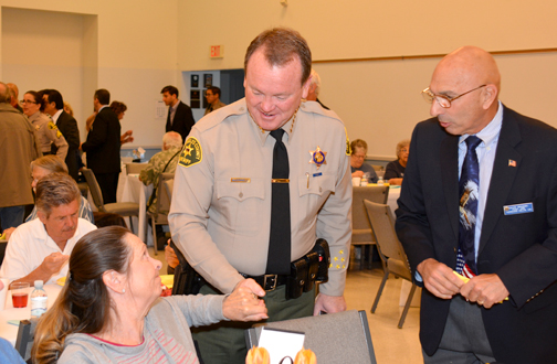Photos by Mary O’KEEFE Newly elect L.A. County Sheriff Jim McDonnell greets one of the attendees of Tuesday’s prayer breakfast before giving the keynote address.