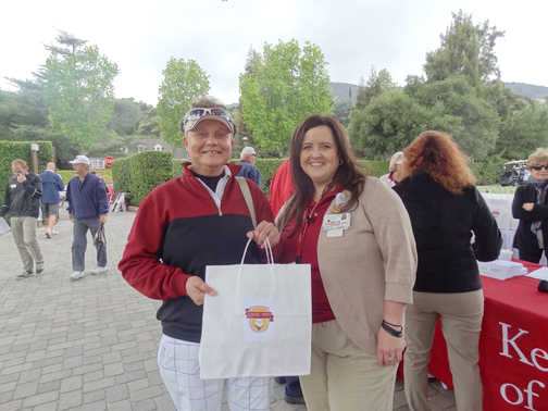 Golfer Heather Staszewski and volunteer Missy Stehlin.