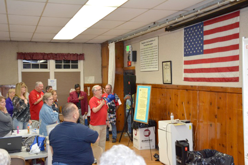 The games opened with the flag salute.