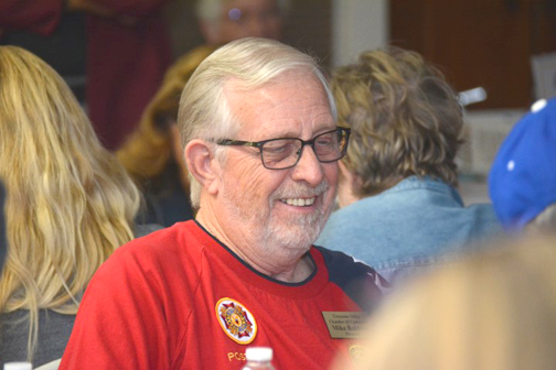 Mike Baldwin, chamber board member, shared a moment with friends.