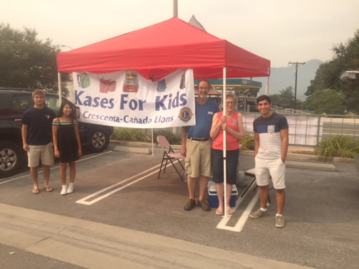 A pop-up tent was set up in the Ralphs Marketplace parking lot on Saturday to collect backpacks for kids entering the foster care system. The collection was overseen by the Crescenta-Cañada Lions Club.