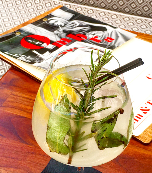 Anchor Gin, coconut lemongrass tonic, black peppercorn, lemonpeel, sage and rosemary garnish