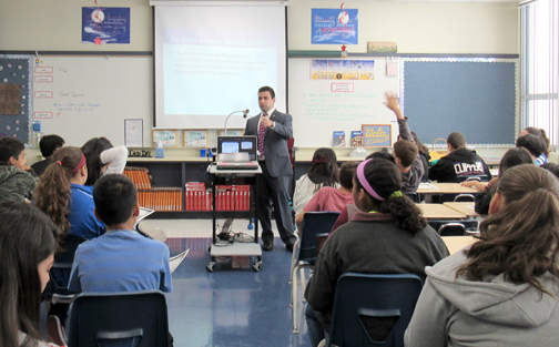 Photo by Mary O’KEEFE Lou Zalyan, who works in the Glendale City Council Clerk’s Office and is a representative of the ACLU, talks to a Rosemont Middle School history class about the Constitution. 