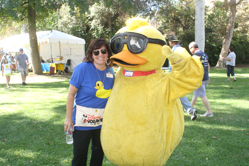 “Duck diva” Toni Beck-Espinoza with KIDS mascot Quacky. 