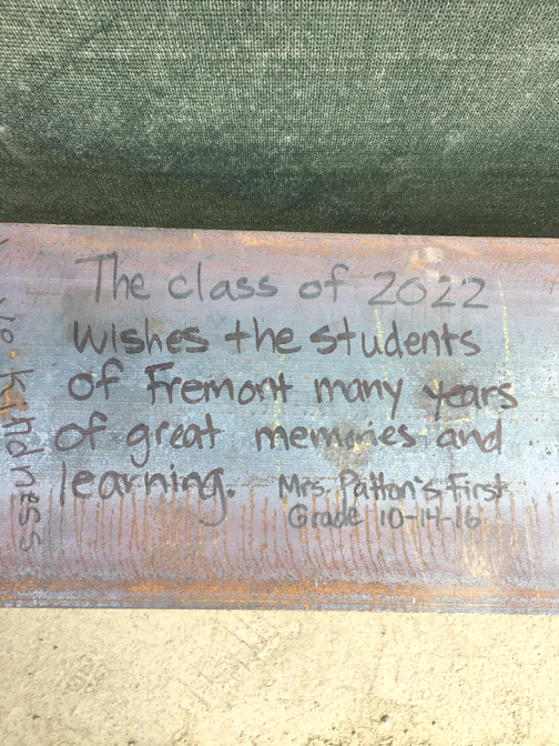 Hundreds of signatures can be found on the support beam.