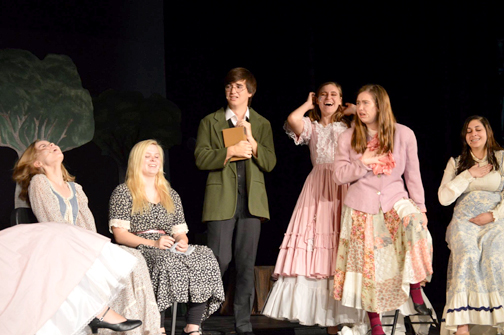 Ichabod Crane (Justin Galvan, standing) with the supporting cast.