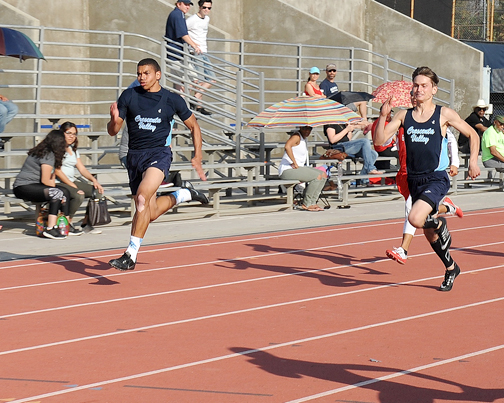 Photos by Leonard COUTIN Springfield won the 100m running his fastest time of 11.28, with Tralongo taking second running 11.31.