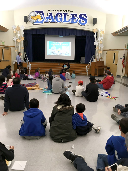 Valley View families listen as reading night begins