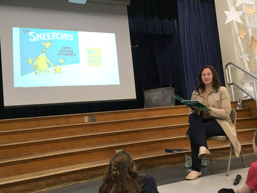Valley View parent, Lisa Larsen, celebrates Dr. Seuss's birthday on reading night