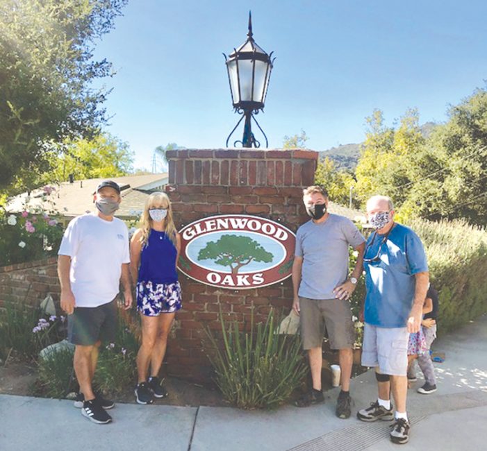 Neighbors Celebrate New Welcoming Sign