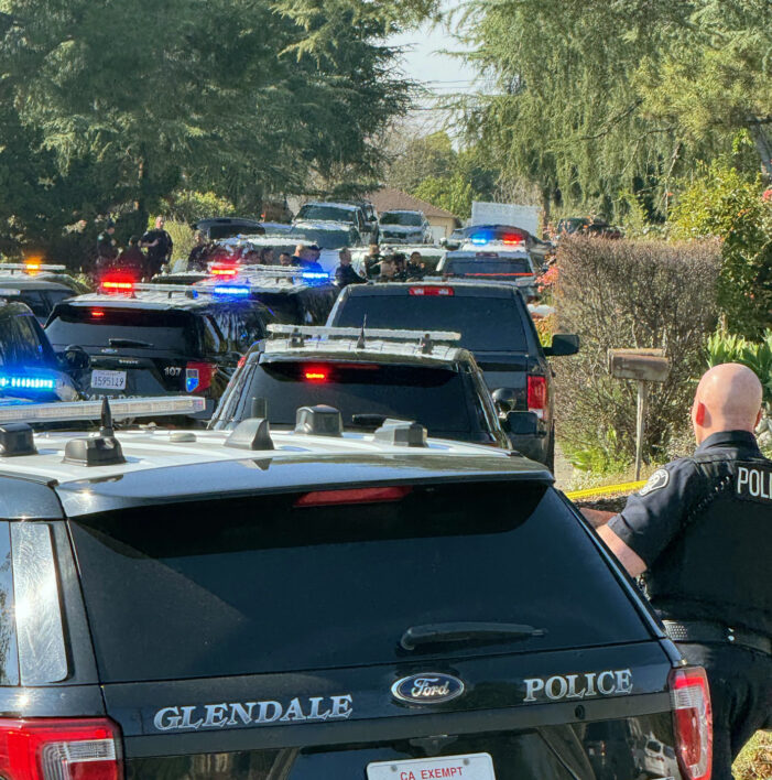 Police Attempt to Communicate with Local Suspect